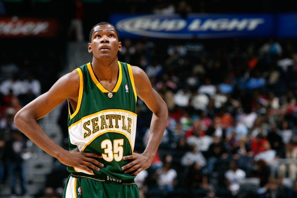 Kevin Durant takes the floor wearing Sonics jersey before preseason game in  Seattle