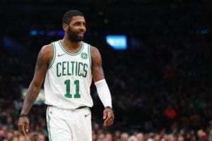 Kyrie Irving #11 of the Boston Celtics reacts during the first half against the Chicago Bulls at TD Garden on November 14.