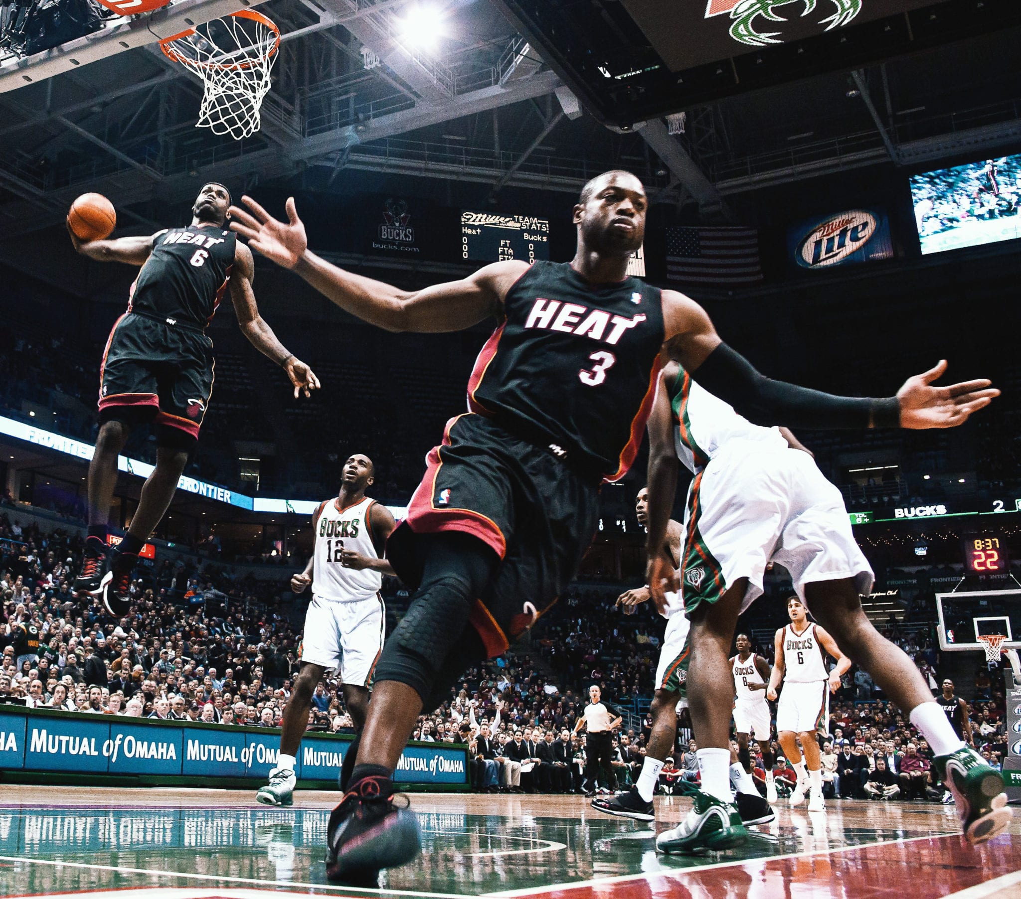 DUNK SQUAD: Dwyane Wade dishes to LeBron James for one of the most famous dunks of all-time (December 6, 2010). 