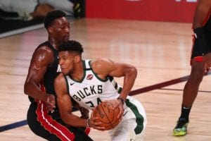 Bucks star Giannis Antetokpounmpo going agaist the Heat's Adebayo