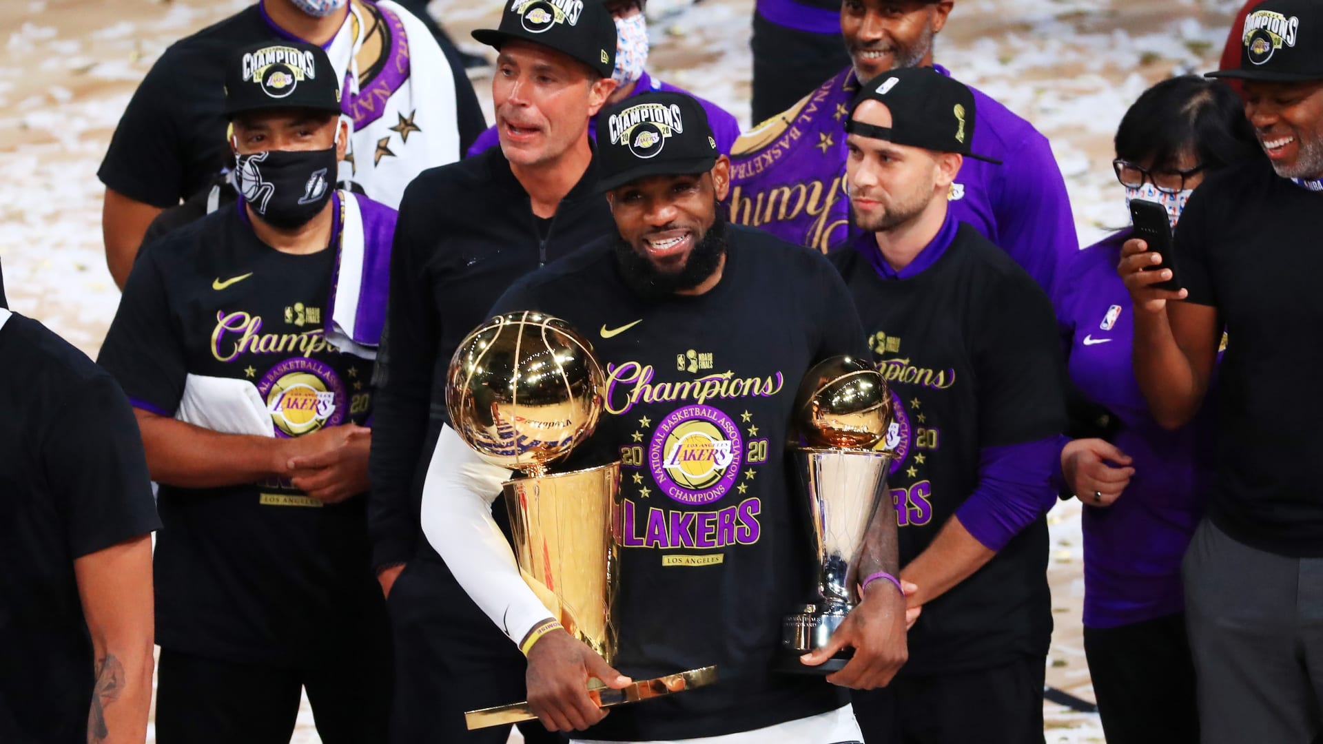 LeBron James of the Lakers with his 4th Finals MVP trophy and title