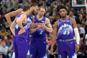 The Utah Jazz players in a huddle