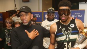 Suns head coach Monty Williams visiting the Bucks locker room