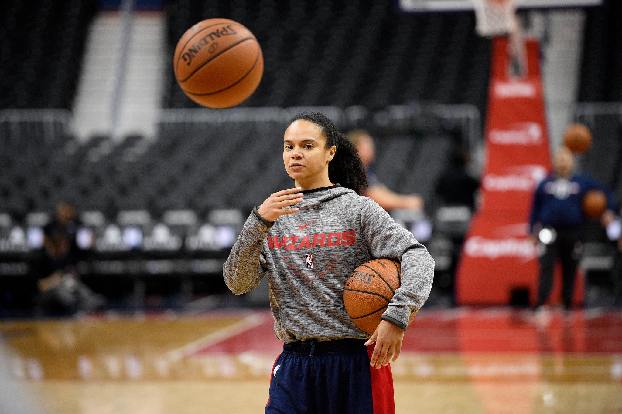 WNBA player Kristi Toliver as a member of the Wizards coaching staff