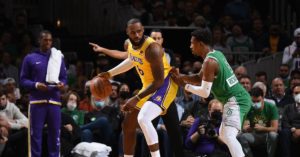 LeBron James of the Lakers posting up Josh Richardson of the Celtics