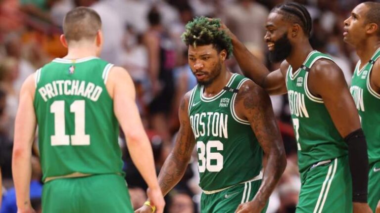 Payton Pritchard and Marcus Smart during a timeout